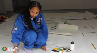 Artist Rema Hamid creating 'Dancing Flags', a public artwork for Culture night 2023
