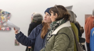 Vistors at 'Tugann an Torann' by Anne Ryan at Temple Bar Gallery + Studios, 2024. Photography by Maria Maarbjerg