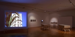 Amina Menia, 'A Peculiar Family Album' (2012) left, and detail of the installation 'Enclosed' (2013), installation view of "Becoming Independent", RHA, Dublin, 2013. Photography by Roland Paschhoff