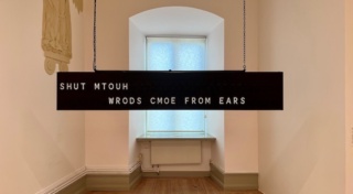 Shilpa Gupta, 'Words Come From Ears', 2018, Motion flapboard, 15-minute loop, 43 x 244 x 13 cm; photograph by Par Fredin, courtesy of the artist, Uppsala Art Museum, and the Henry Moore Institute.