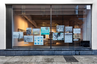Agiation Co op gallery window news